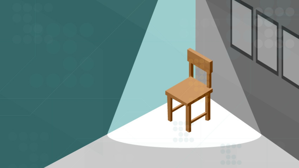 Image of brown solo chair in corner in spotlight