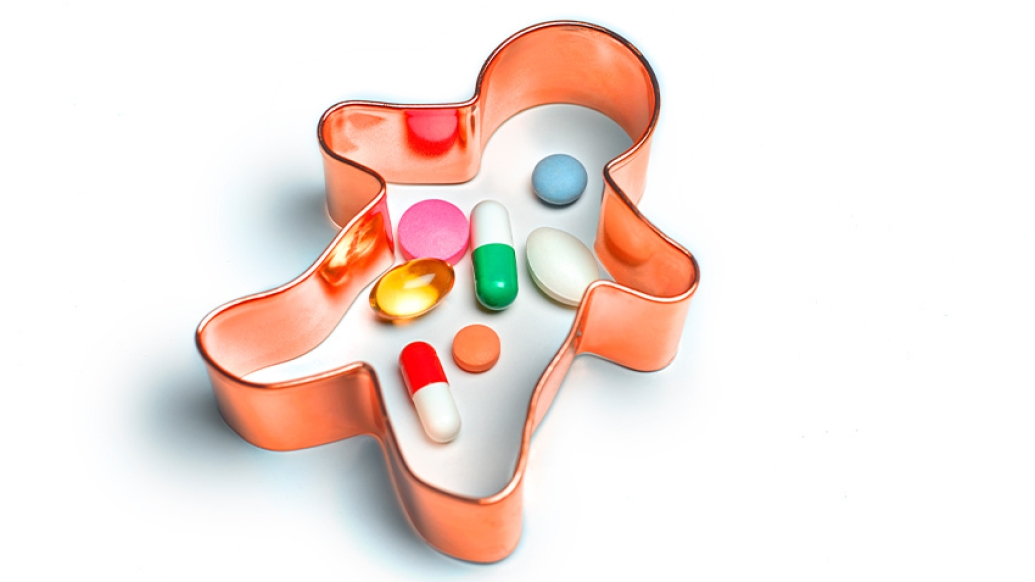 cookie cutter with pills inside in colorful colors