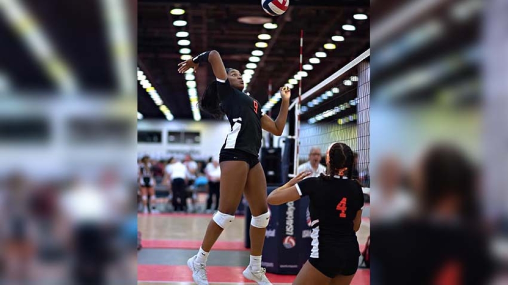 Nicole Hughes playing volleyball before her knee injury