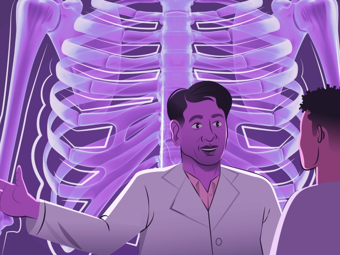 skeleton large in back of doctor talking to patient