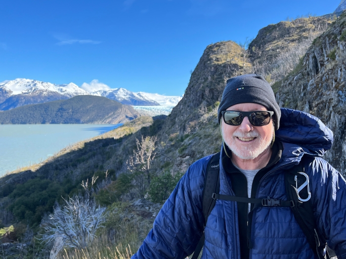 man on top of mountain