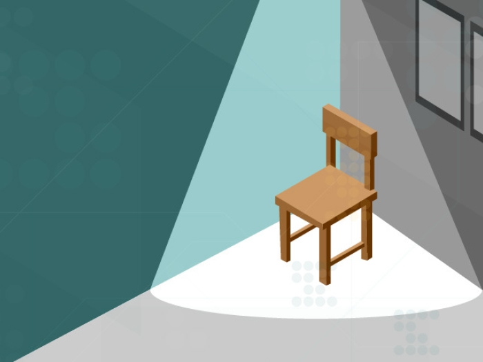 Image of brown solo chair in corner in spotlight