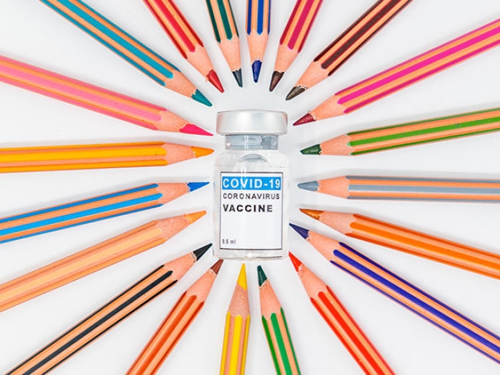 colored pencils coronavirus vaccine vial 
