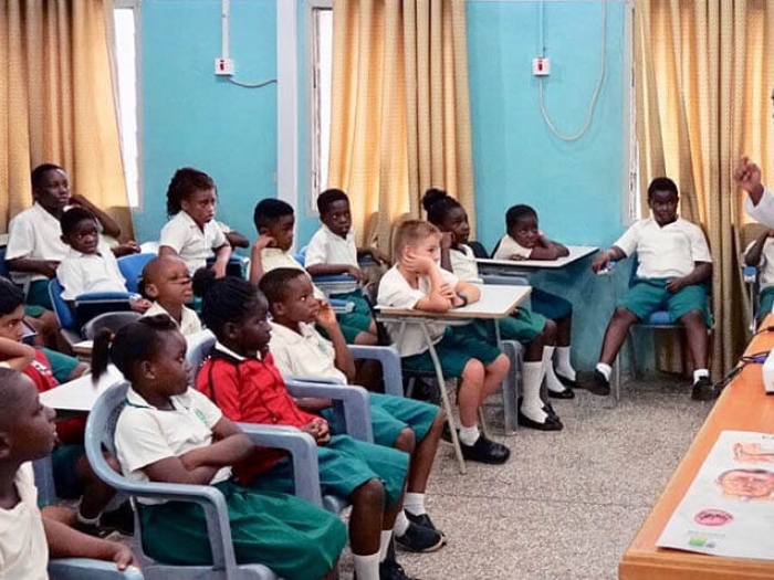 Dr. Truesdale teaching kids in classroom