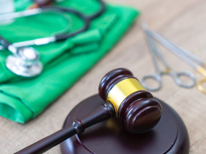 Gavel with medical supplies