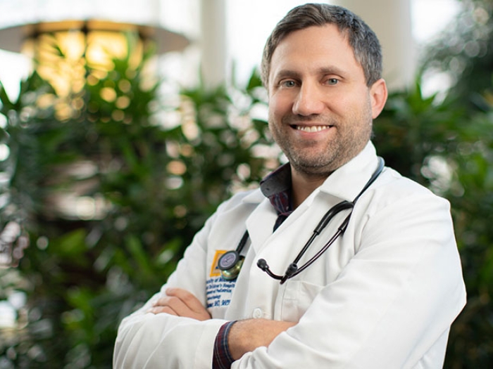 Daniel Shumer, M.D. posing in lobby