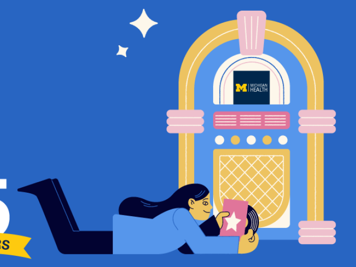 michigan medicine music box with person laying on ground with CD