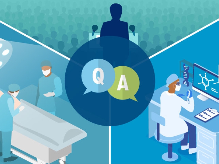 blue background with OR and research and at podium in front of office