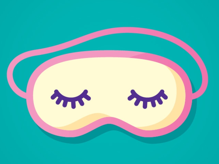 pink yellow mask with closed eyelashes on it on teal blue background