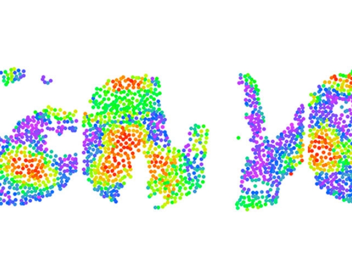 rainbow colored dots on white background