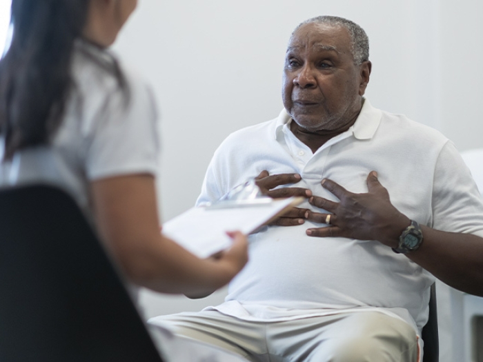 older man medical exam chest 