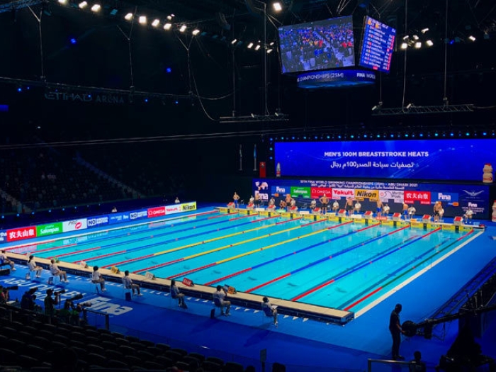 stadium swim pool water lights in dark on