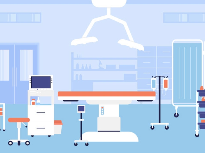 Surgery table in operating room with lights above