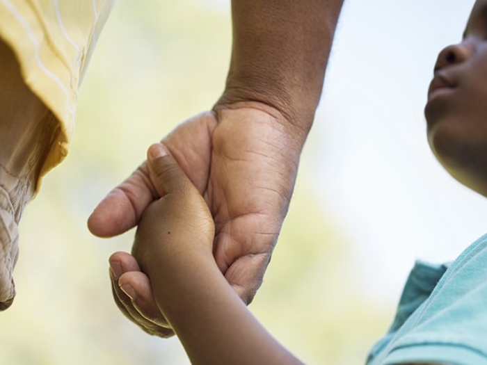 A father talking to his son about vicarious racism