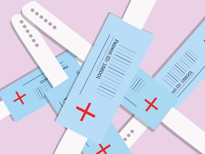 A collection of hospital wristbands signifying hospital readmission