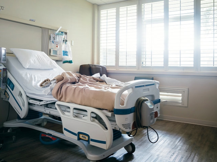 vacant hospital room bed