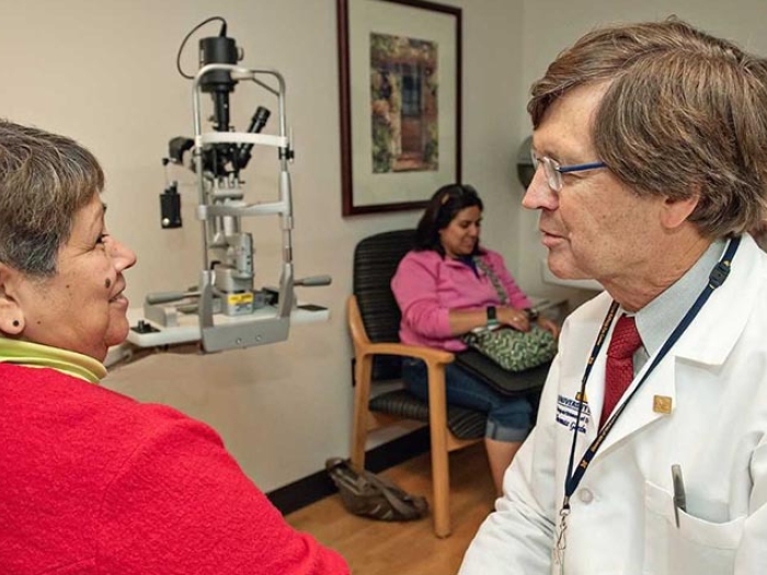 doctor and patient talking in a room