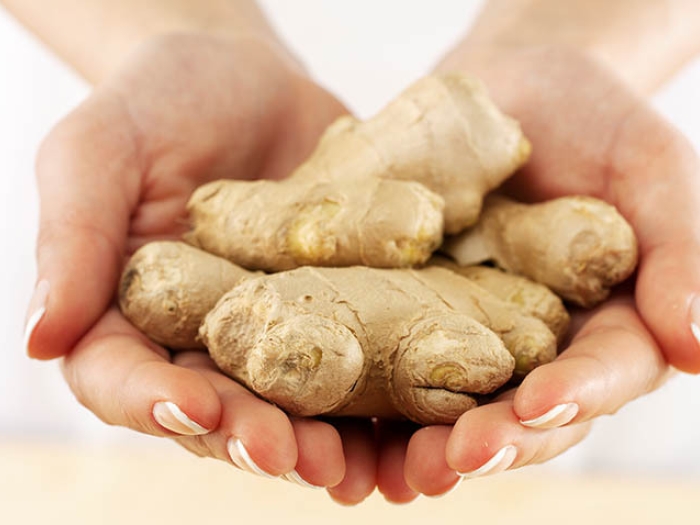 ginger root in hands