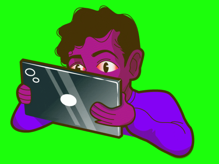 kid looking close to screen blinking bright green background