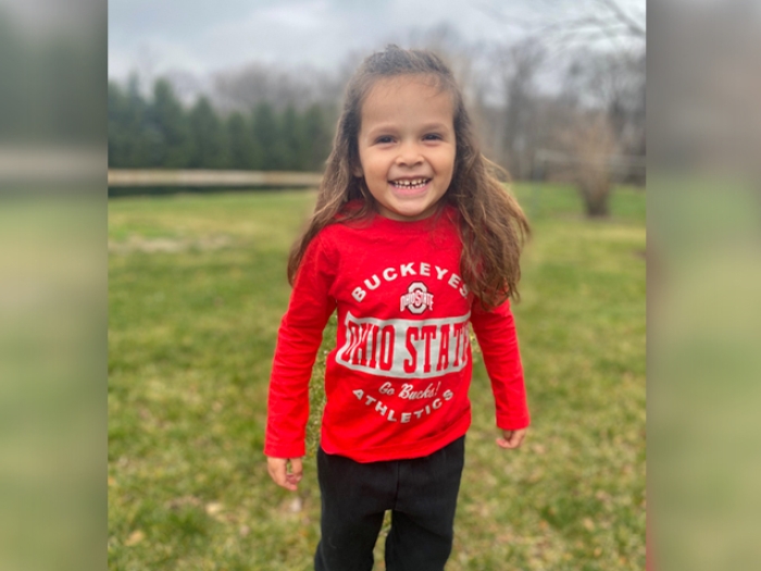 little girl in red shirt