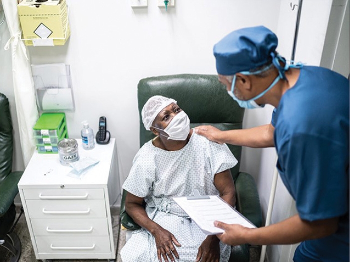 man hospital room doctor mask