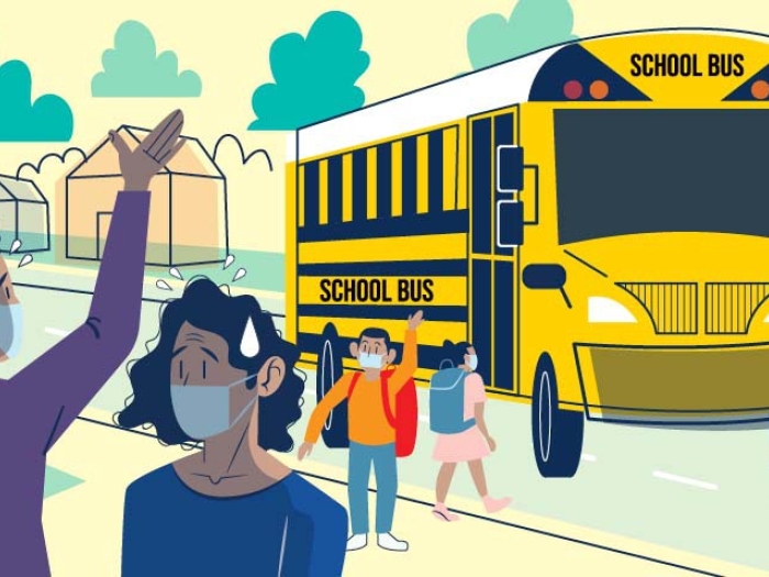 parents masked looking worried and waving to kids in masks going on yellow bus