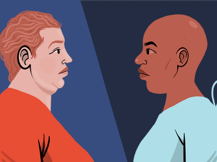 two women looking at eachother red shirt blue patient covering