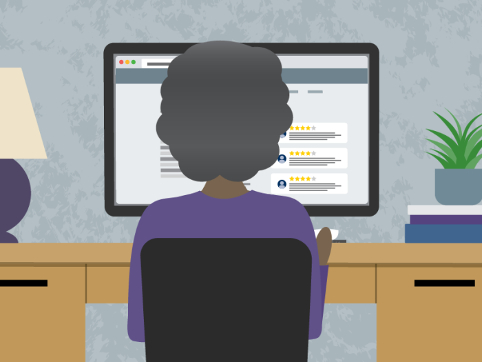 woman on computer in room