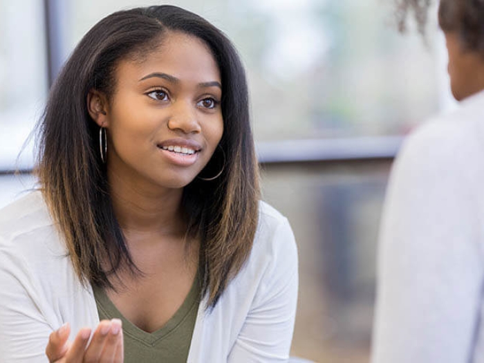 Women mentoring student