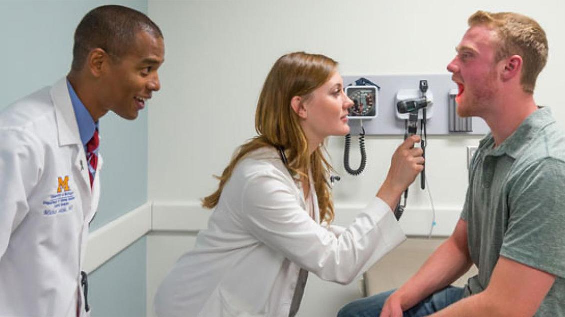 Doctors examining a patient