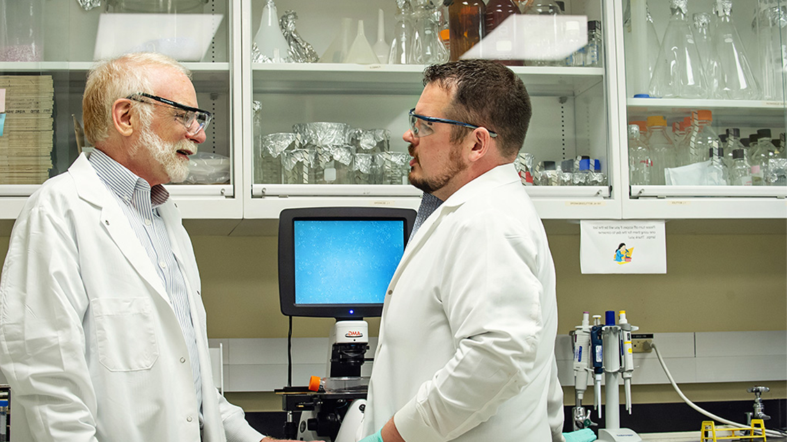 Two researchers in conversation